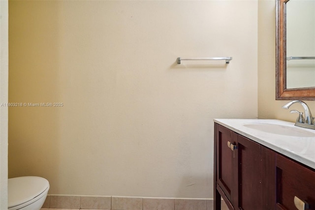 7081 Environ Blvd Unit 243, Lauderhill, FL 33319 - half bath featuring vanity, toilet, and tile patterned flooring