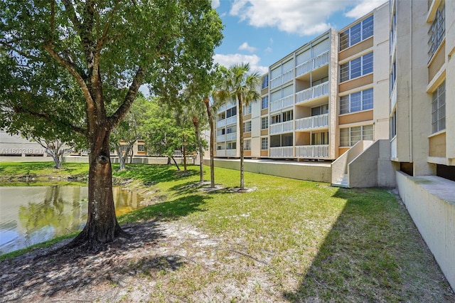 view of community featuring a yard