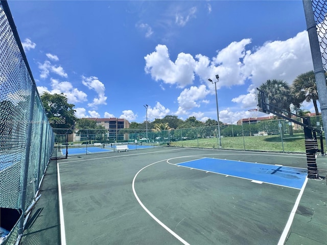 7081 Environ Blvd Unit 243, Lauderhill, FL 33319 - view of basketball court with a tennis court and community basketball court