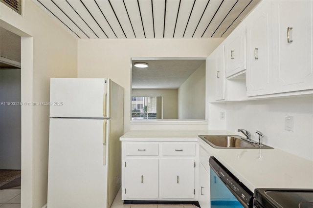 3774 Inverrary Blvd Unit 203P, Lauderhill, FL 33319 - kitchen featuring freestanding refrigerator, dishwasher, light countertops, and white cabinetry