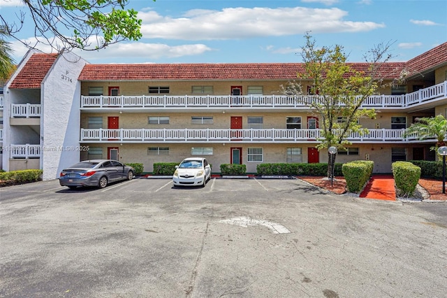 3774 Inverrary Blvd Unit 203P, Lauderhill, FL 33319 - view of building exterior featuring uncovered parking