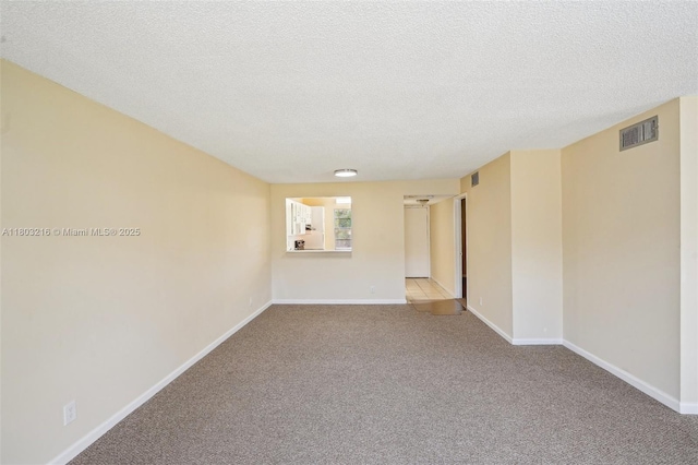 3774 Inverrary Blvd Unit 203P, Lauderhill, FL 33319 - carpeted empty room with a textured ceiling and baseboards