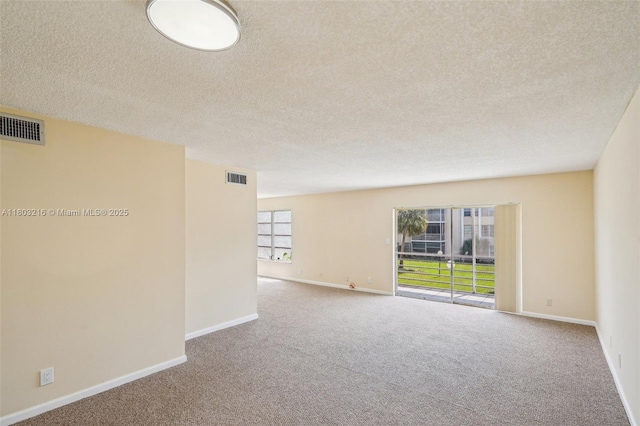 3774 Inverrary Blvd Unit 203P, Lauderhill, FL 33319 - spare room with carpet and a textured ceiling