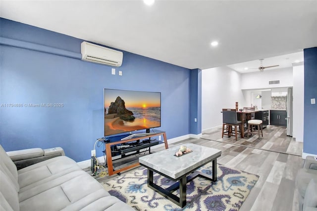 8113 SW 22nd Ct Unit 150, Davie, FL 33324 - living area featuring a wall mounted air conditioner, wood finished floors, baseboards, and recessed lighting