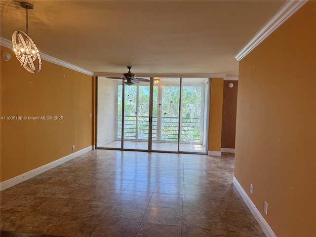 9420 Poinciana Pl Unit 403, Davie, FL 33324 - spare room featuring ornamental molding, baseboards, a ceiling fan, and a chandelier