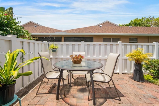 8080 Sweetbriar Way, Boca Raton, FL 33496 - view of patio / terrace with fence and outdoor dining space