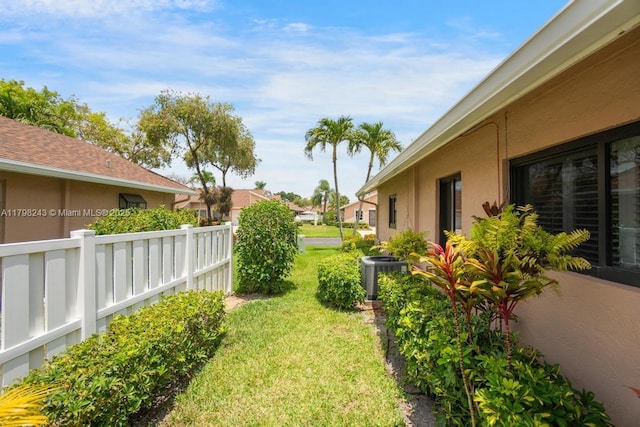 8080 Sweetbriar Way, Boca Raton, FL 33496 - view of yard with central AC unit and a residential view