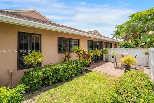 8080 Sweetbriar Way, Boca Raton, FL 33496 - view of yard featuring a patio area