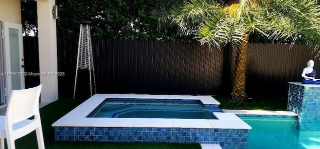 155 W 60th St, Hialeah, FL 33012 - view of swimming pool with an in-ground hot tub