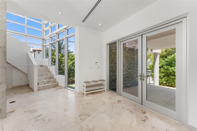 544 Fernwood Rd Unit 544, Key Biscayne, FL 33149 - entryway with french doors, marble finish floors, stairway, and recessed lighting