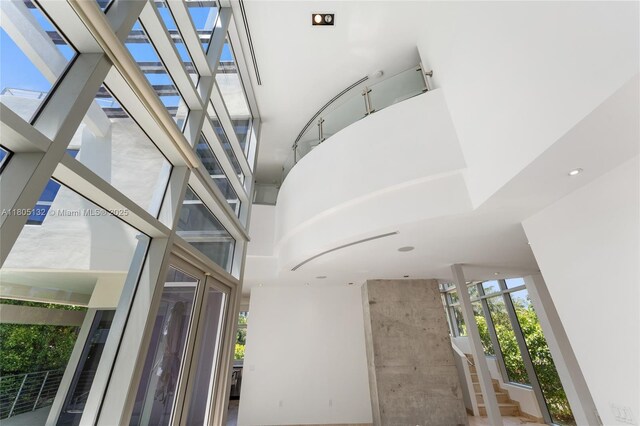 544 Fernwood Rd Unit 544, Key Biscayne, FL 33149 - staircase with a high ceiling