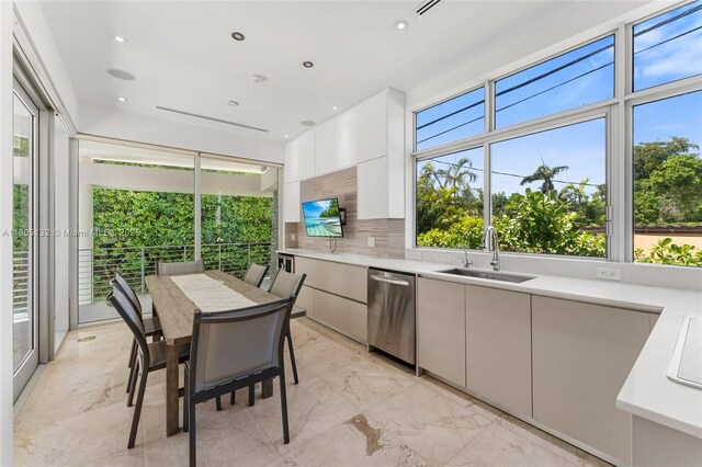 544 Fernwood Rd Unit 544, Key Biscayne, FL 33149 - kitchen with a sink, stainless steel dishwasher, modern cabinets, backsplash, and recessed lighting