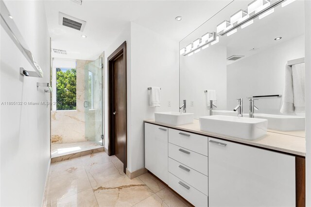 544 Fernwood Rd Unit 544, Key Biscayne, FL 33149 - bathroom featuring a shower stall, double vanity, marble finish floors, recessed lighting, and baseboards