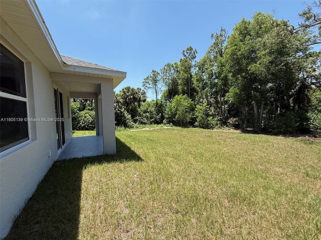 2812 10th St W, Lehigh Acres, FL 33971 - view of grassy yard