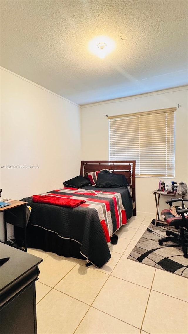 21463 NE 3rd Path, Miami, FL 33179 - bedroom with light tile patterned flooring and a textured ceiling