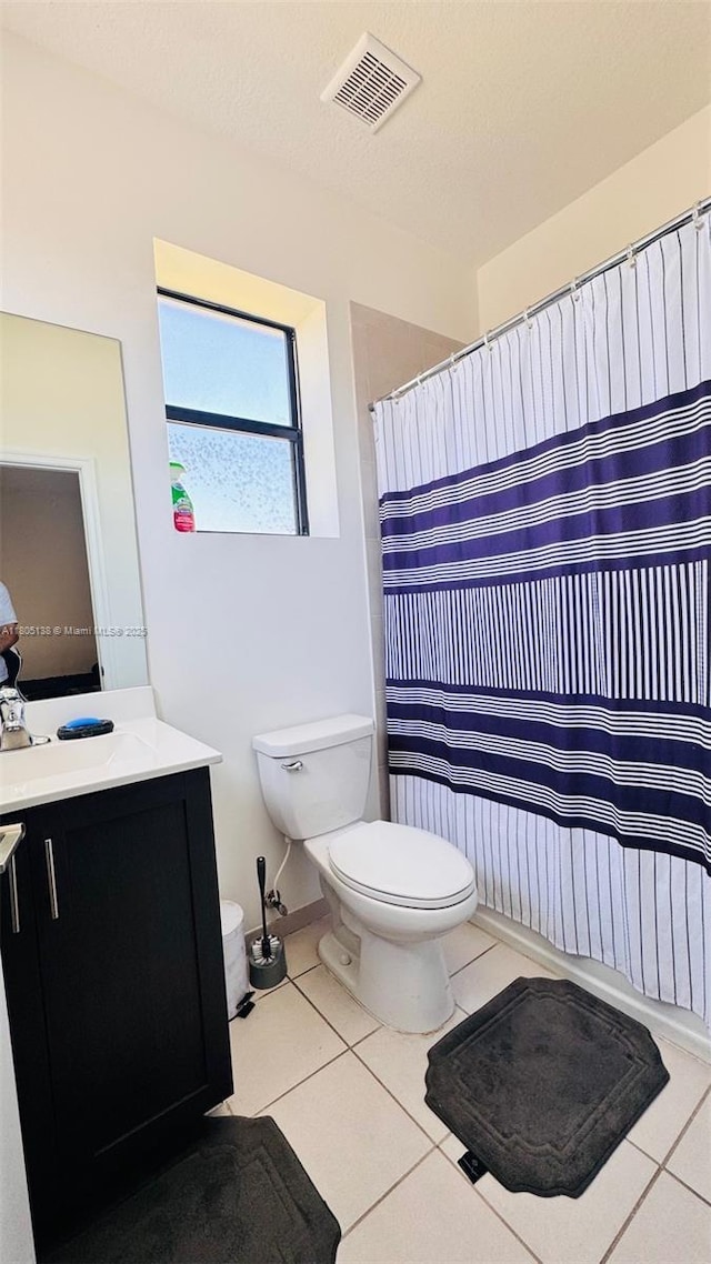 21463 NE 3rd Path, Miami, FL 33179 - bathroom featuring toilet, vanity, tile patterned flooring, and curtained shower