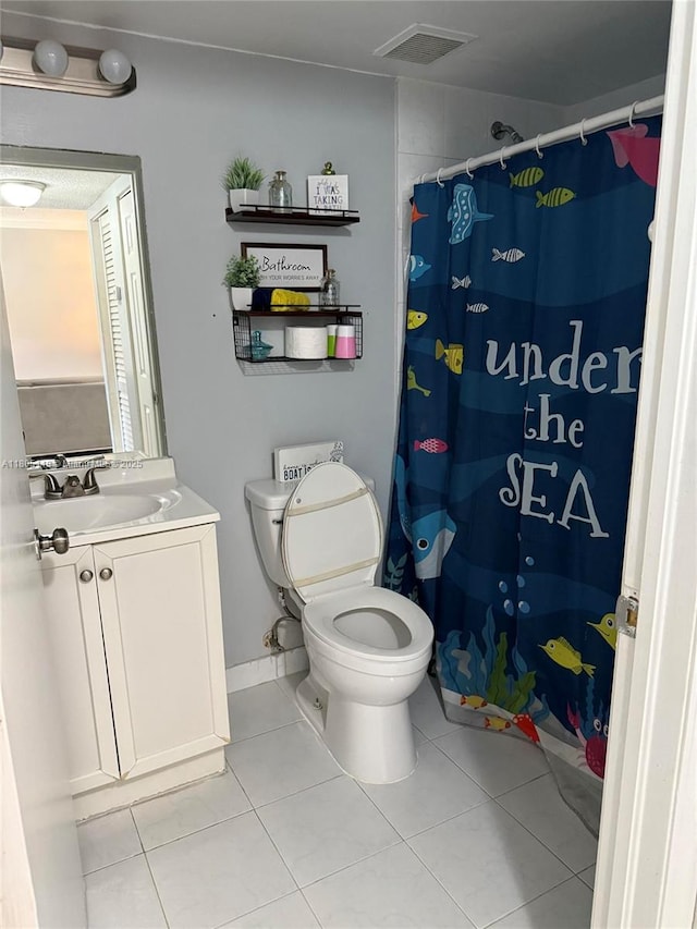 6416 SW 131st Path Unit 1709, Miami, FL 33183 - full bathroom featuring tile patterned floors, toilet, vanity, and curtained shower