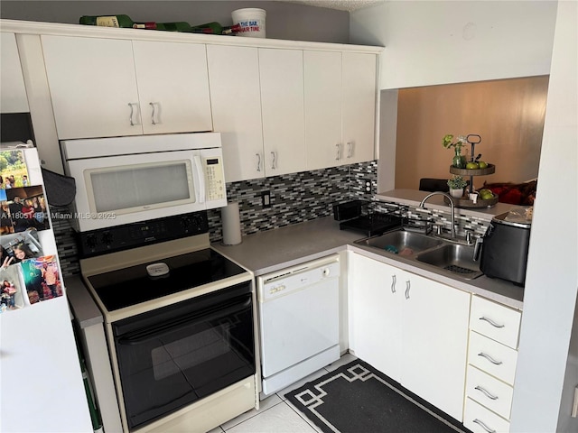6416 SW 131st Path Unit 1709, Miami, FL 33183 - kitchen featuring white appliances, a sink, white cabinetry, and backsplash