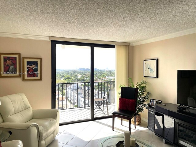 2625 Collins Ave Unit 1409, Miami Beach, FL 33140 - living area featuring a textured ceiling, ornamental molding, and tile patterned floors