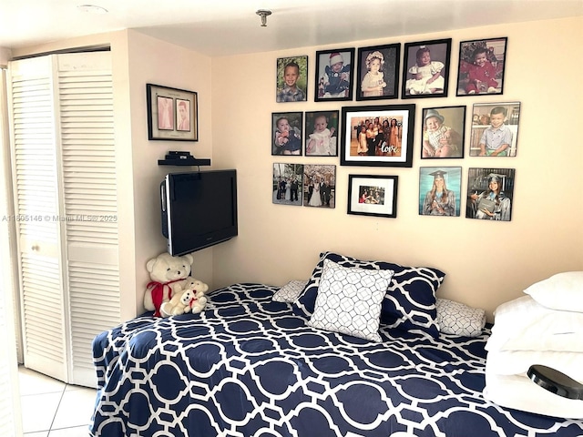 2625 Collins Ave Unit 1409, Miami Beach, FL 33140 - bedroom featuring a closet and tile patterned floors
