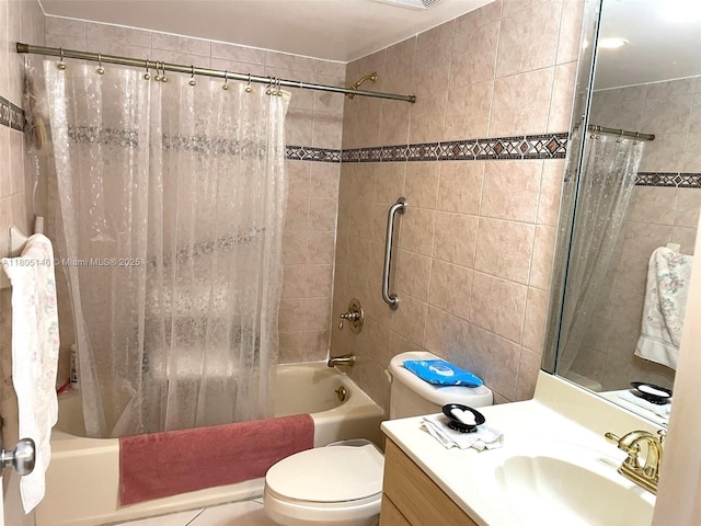 2625 Collins Ave Unit 1409, Miami Beach, FL 33140 - bathroom with shower / bath combo, vanity, and toilet