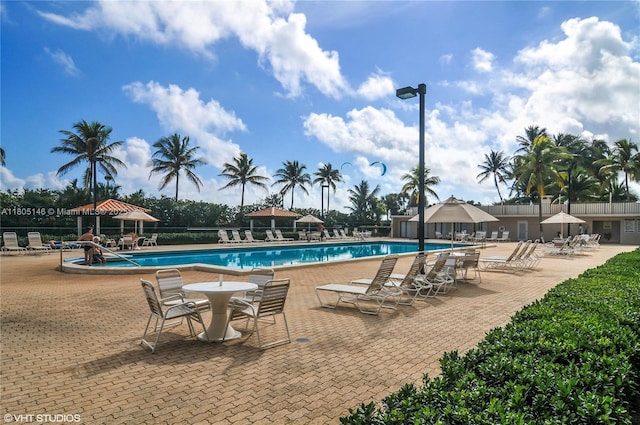2625 Collins Ave Unit 1409, Miami Beach, FL 33140 - community pool with fence and a patio area