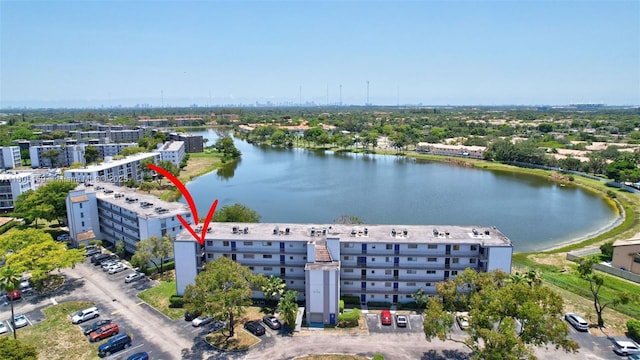 8720 N Sherman Cir Unit 401, Miramar, FL 33025 - drone / aerial view of a nearby body of water and apartment complex