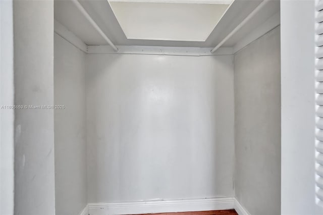 8720 N Sherman Cir Unit 401, Miramar, FL 33025 - spacious closet featuring wood finished floors