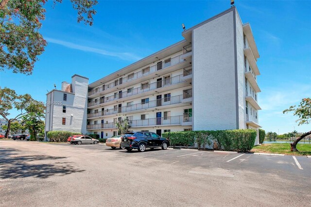 8720 N Sherman Cir Unit 401, Miramar, FL 33025 - view of property with uncovered parking