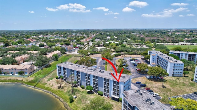 8720 N Sherman Cir Unit 401, Miramar, FL 33025 - drone / aerial view of a nearby body of water and apartment complex / building
