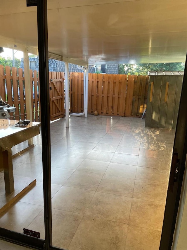 1670 Forest Lakes Cir Unit C, West Palm Beach, FL 33406 - view of patio / terrace with a gate and fence