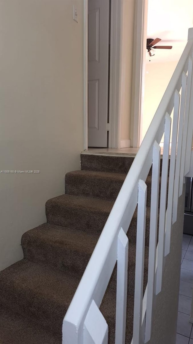 1670 Forest Lakes Cir Unit C, West Palm Beach, FL 33406 - stairway featuring a ceiling fan