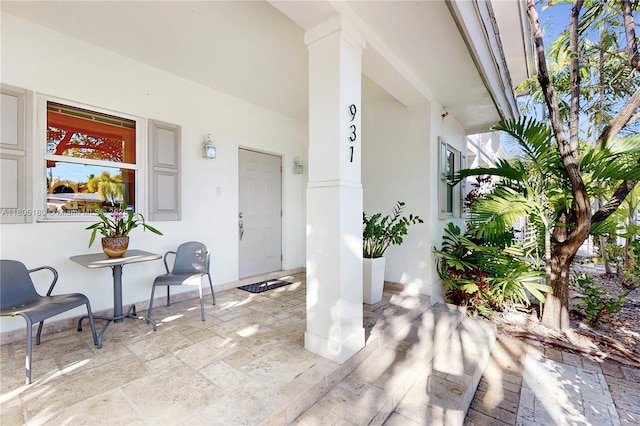 931 SW 11th St Unit H-1, Miami, FL 33129 - doorway to property with stucco siding and a porch