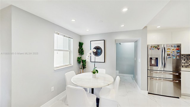 931 SW 11th St Unit H-1, Miami, FL 33129 - dining area with light marble finish floors, recessed lighting, and baseboards