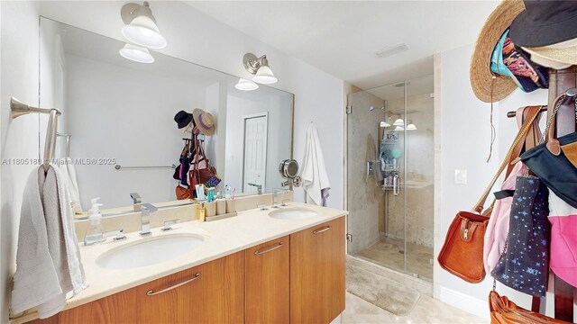 931 SW 11th St Unit H-1, Miami, FL 33129 - full bath with a shower stall, double vanity, and tile patterned floors