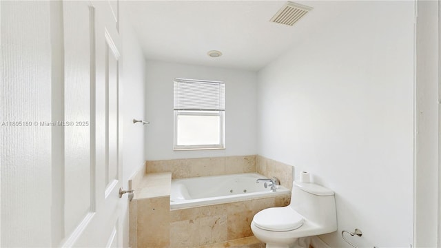 931 SW 11th St Unit H-1, Miami, FL 33129 - bathroom featuring a whirlpool tub and toilet