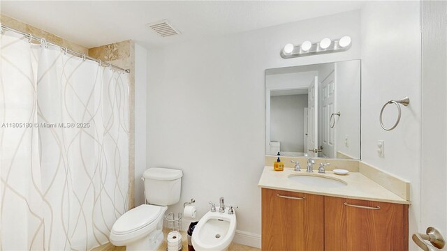 931 SW 11th St Unit H-1, Miami, FL 33129 - bathroom featuring vanity, a bidet, toilet, and a shower with curtain