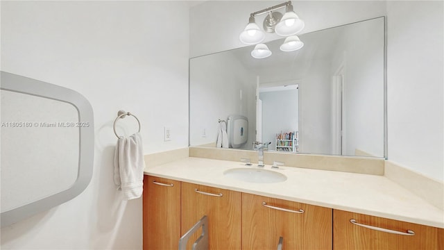 931 SW 11th St Unit H-1, Miami, FL 33129 - bathroom featuring vanity and a chandelier