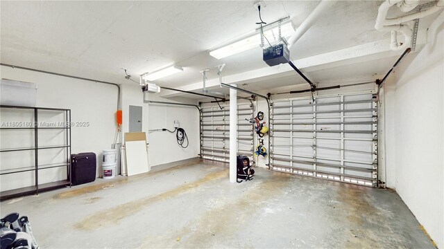 931 SW 11th St Unit H-1, Miami, FL 33129 - garage with a garage door opener and electric panel