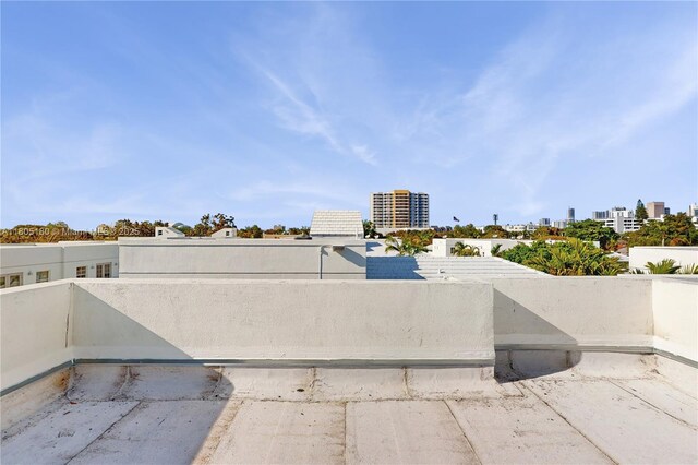 931 SW 11th St Unit H-1, Miami, FL 33129 - view of patio / terrace featuring a balcony and a city view