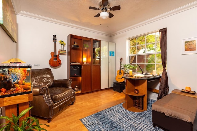 15332 SW 142nd Ter, Miami, FL 33196 - living area featuring light wood-style floors, ceiling fan, and crown molding