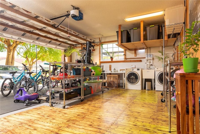 15332 SW 142nd Ter, Miami, FL 33196 - garage featuring washing machine and clothes dryer, a ceiling fan, and a garage door opener