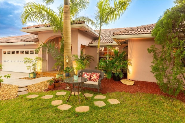 15332 SW 142nd Ter, Miami, FL 33196 - view of grassy yard featuring driveway and a garage
