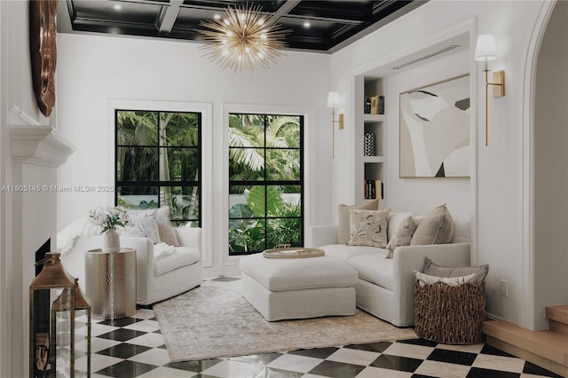 549 NE 59th St, Miami, FL 33137 - living area featuring coffered ceiling, built in shelves, and beamed ceiling
