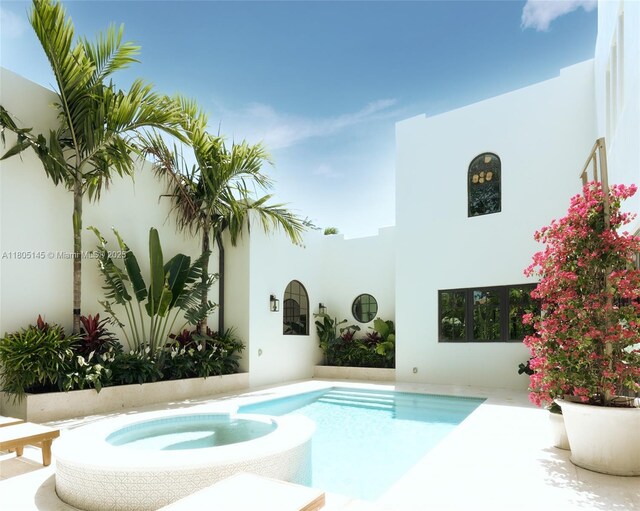 549 NE 59th St, Miami, FL 33137 - view of pool featuring a pool with connected hot tub