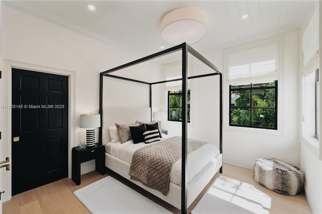 549 NE 59th St, Miami, FL 33137 - bedroom featuring ornamental molding, light wood finished floors, and recessed lighting