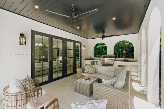 549 NE 59th St, Miami, FL 33137 - view of patio / terrace featuring french doors, ceiling fan, an outdoor living space, and a sink
