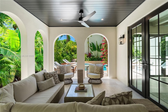 549 NE 59th St, Miami, FL 33137 - view of patio featuring french doors, a ceiling fan, and an outdoor living space