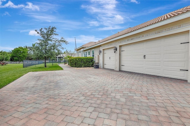 5474 S Sterling Ranch Cir, Davie, FL 33314 - garage featuring decorative driveway