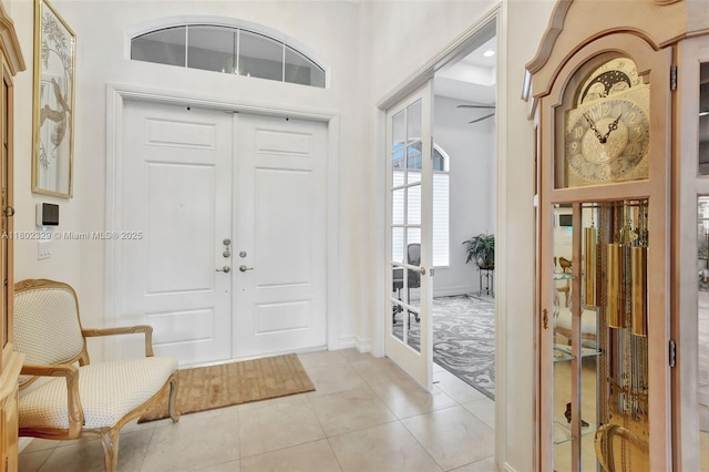 5474 S Sterling Ranch Cir, Davie, FL 33314 - foyer entrance featuring french doors, light tile patterned flooring, and baseboards